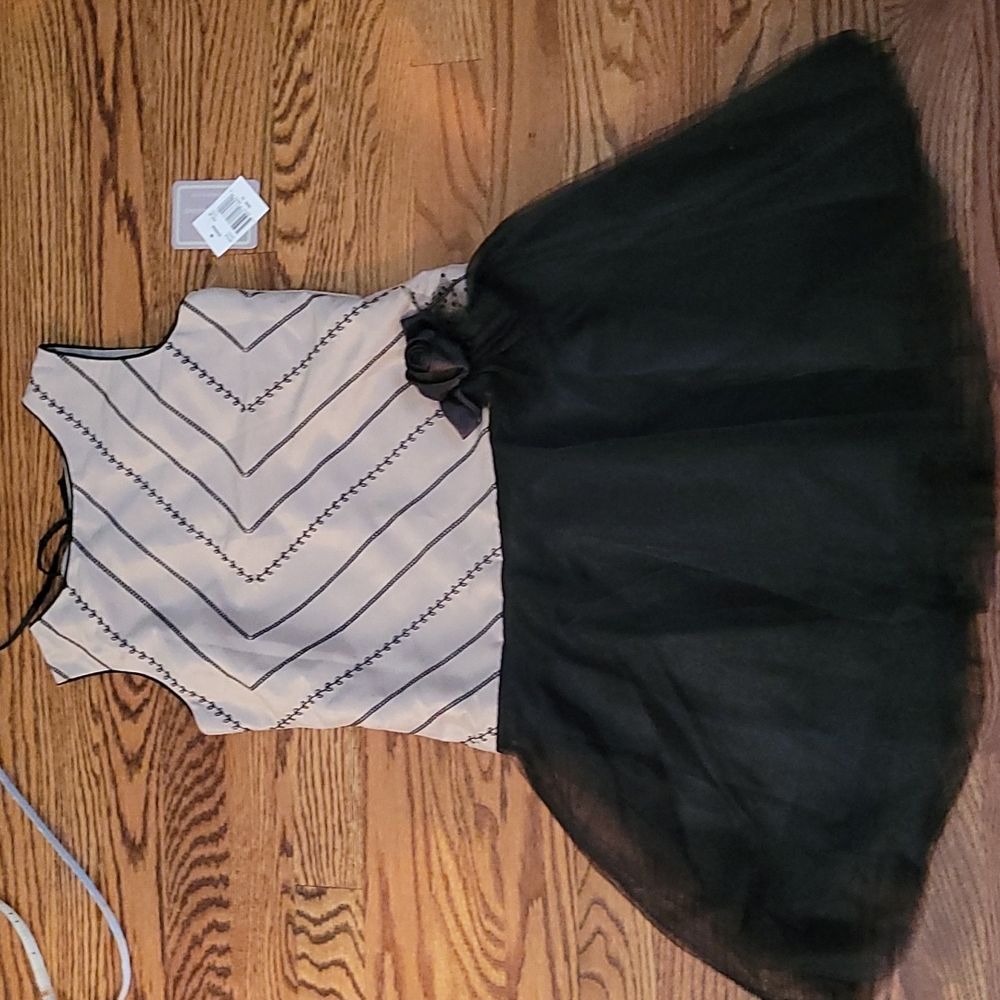 dress with sewn-on patterns